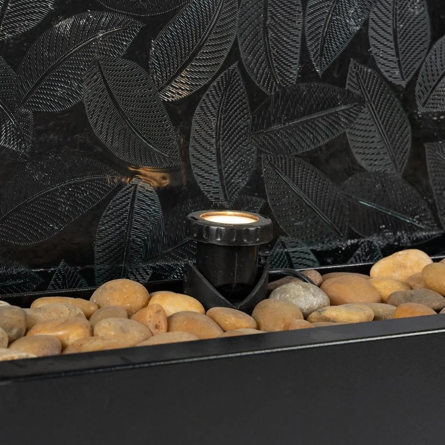 72-inch indoor/outdoor water fountain featuring a clear glass panel with a raised leaf design and a modern waterfall style.