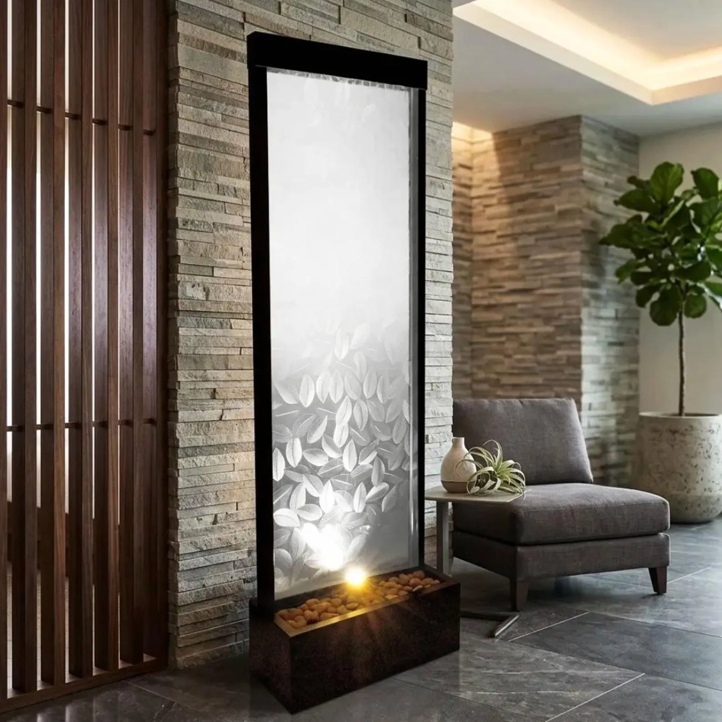 72-inch indoor/outdoor water fountain featuring a clear glass panel with a raised leaf design and a modern waterfall style.